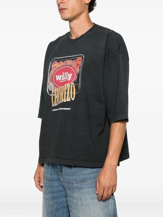 Black t-shirt worn by a person, showing the t-shirt fit