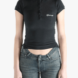 Black t-shirt worn by a person, showing the t-shirt's fit