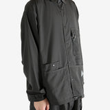 Black jacket worn by a person, showing the jacket fit