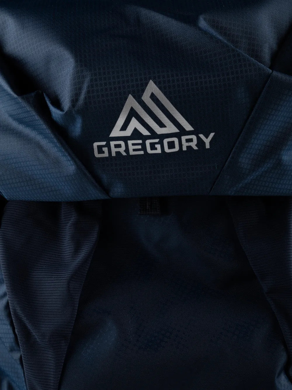 Close up of Navy bag, showing texture of the mesh fabric