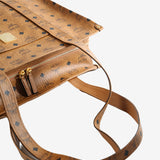 Close up of brown bag, showing texture of the Leather fabric
