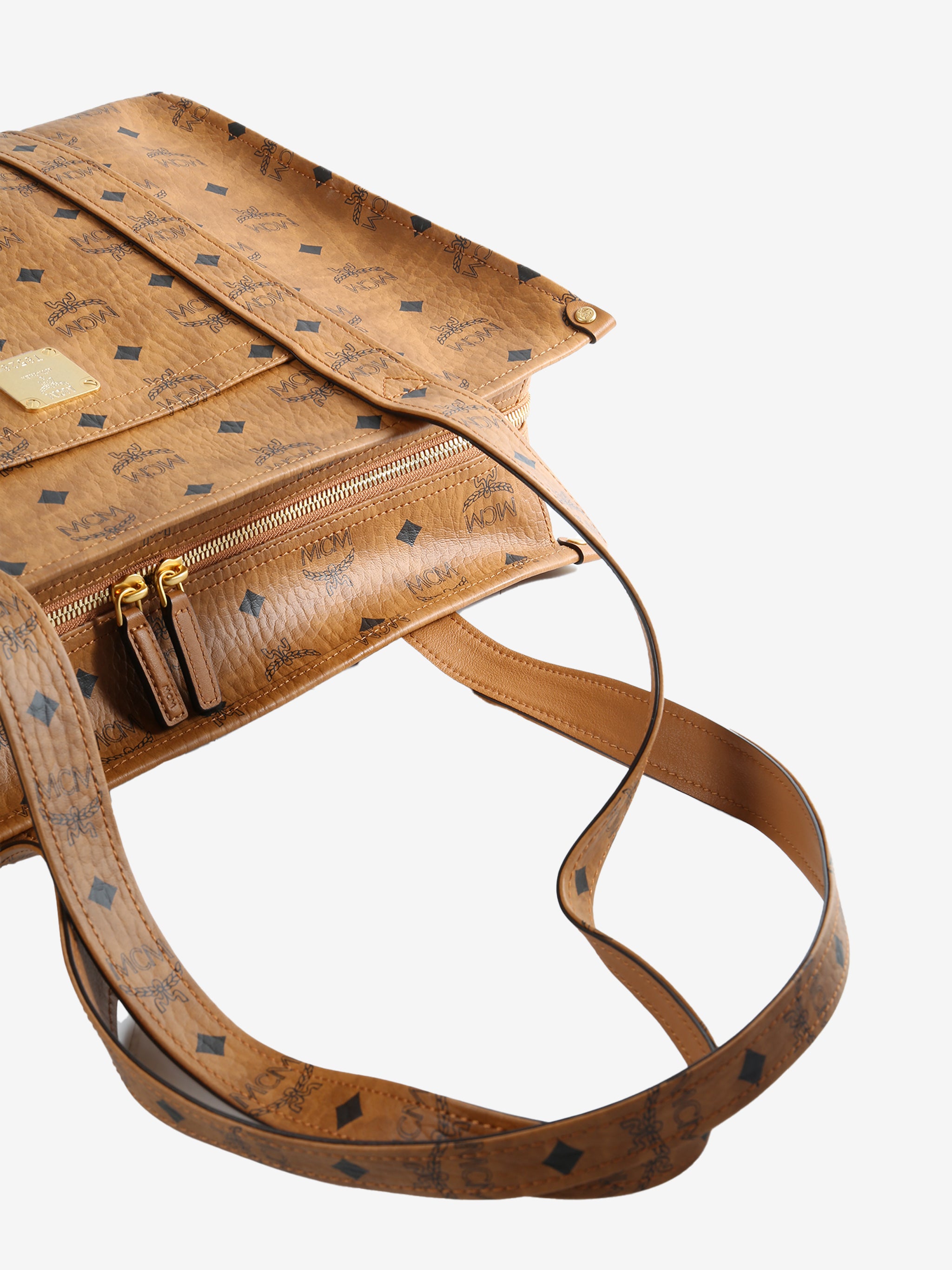 Close up of brown bag, showing texture of the Leather fabric
