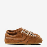 Tan sneakers, front view