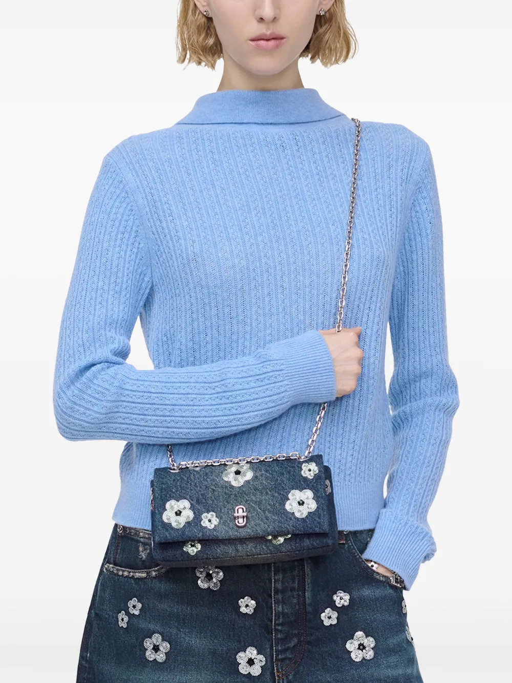 Blue bag worn by a person, showing the bag fit