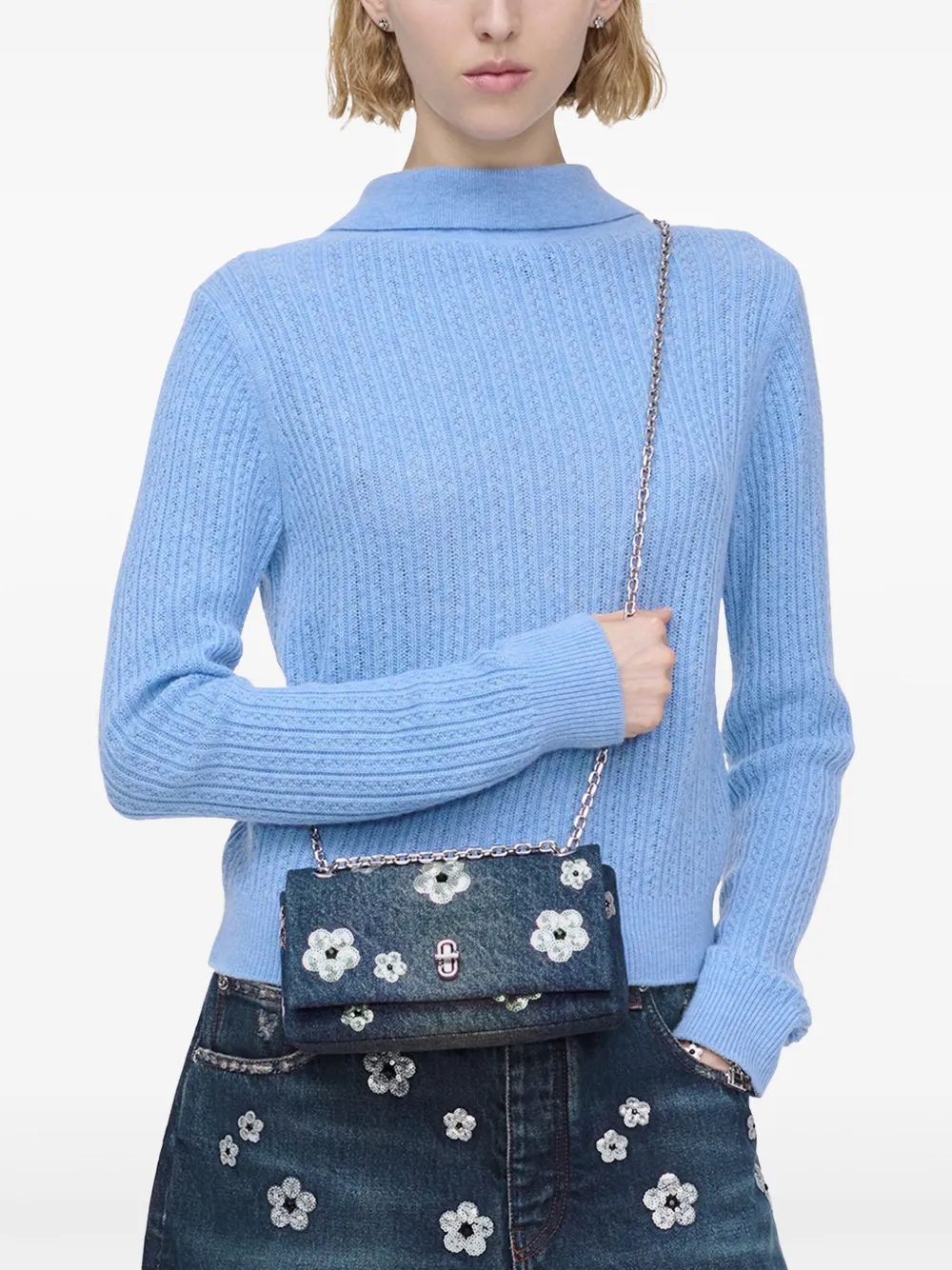 Blue bag worn by a person, showing the bag fit