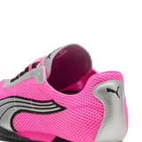 close up of pink sneakers, showing texture of the rubber fabric