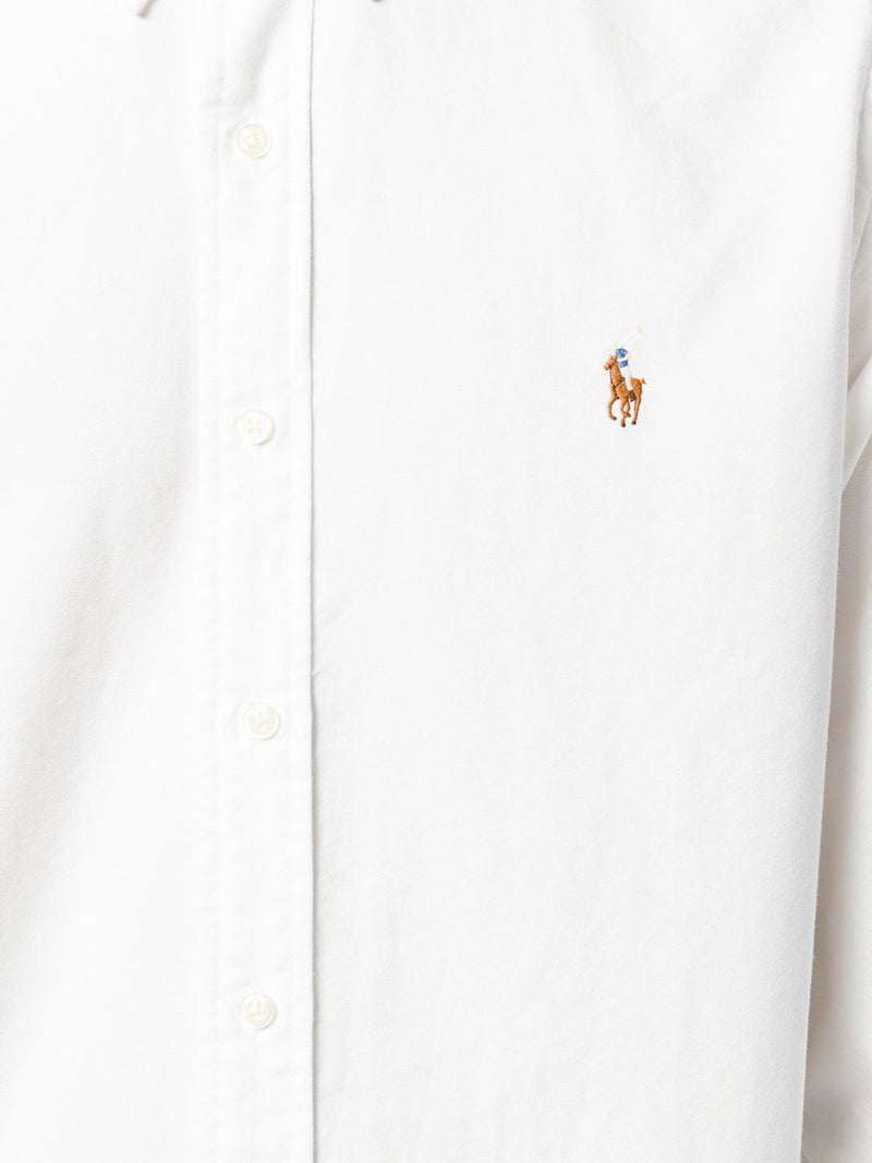 Close up of white shirt, showing texture of the cotton fabric 