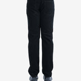 Black pants worn by a person, showing the pants's fit