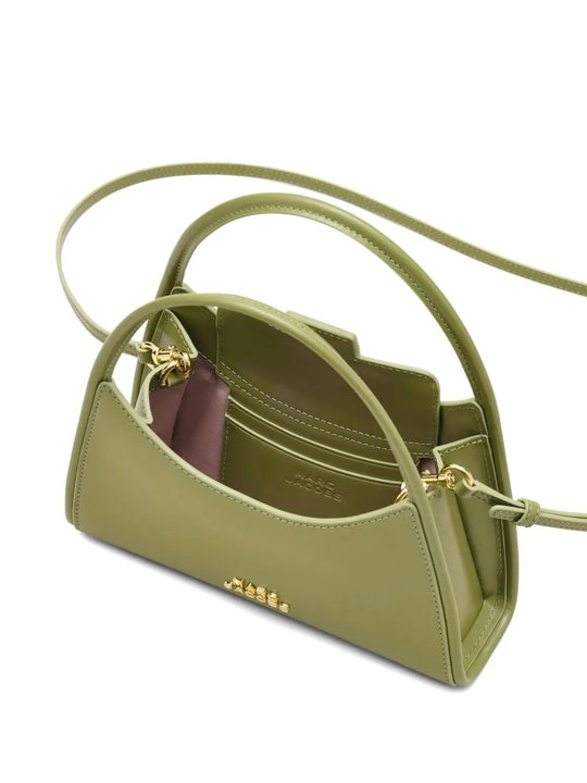 Close up of the green bag, showing texture of the leather fabric