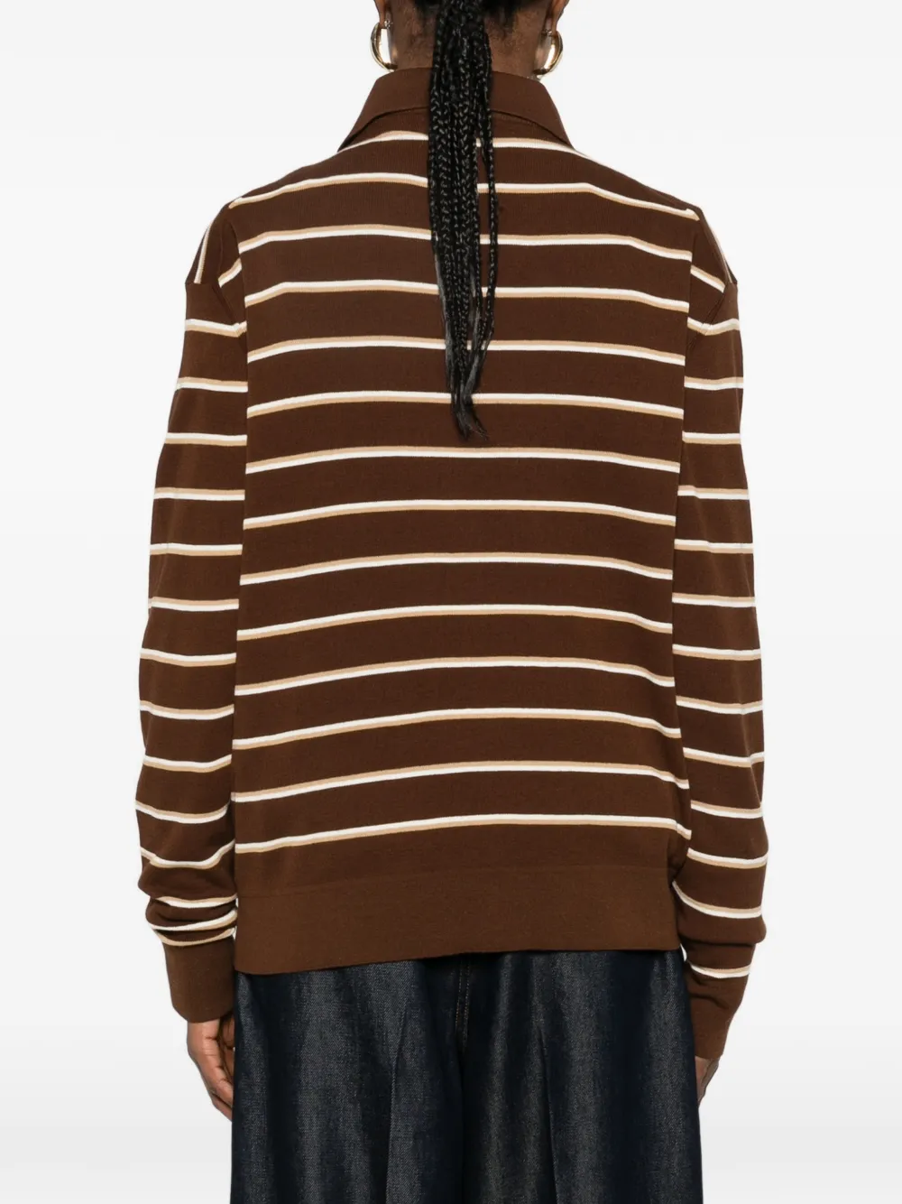 Brown shirt worn by a person, showing the shirt's fit