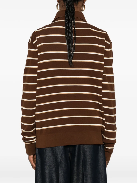 Brown shirt worn by a person, showing the shirt's fit