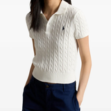 White t-shirt worn by a person, showing the shirt's fit