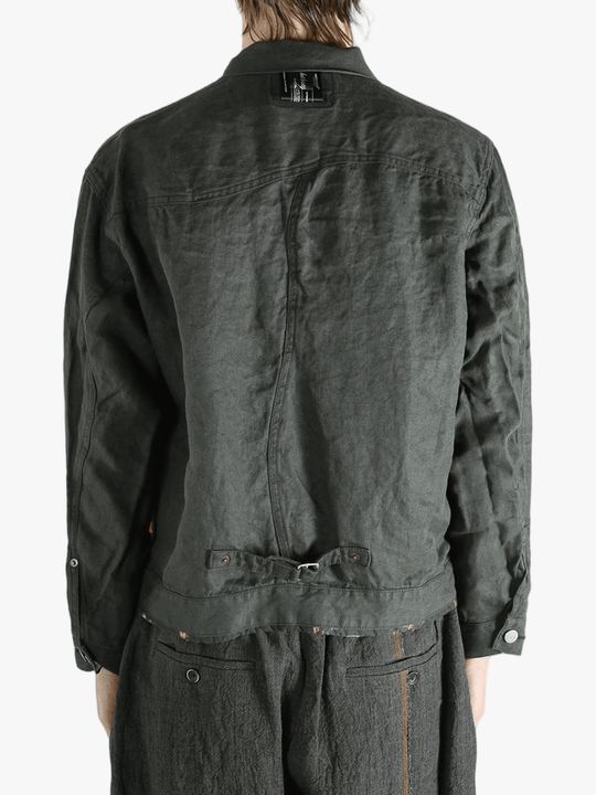 Black jacket worn by a person, showing the jacket's fit