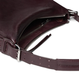 Close up of brown leather handbag,showing texture of the leather fabric