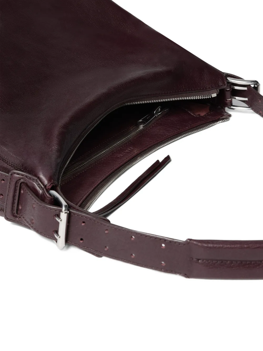 Close up of brown leather handbag,showing texture of the leather fabric