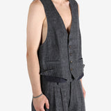 Grey waistcoat worn by a person, showing the waistcoat fit
