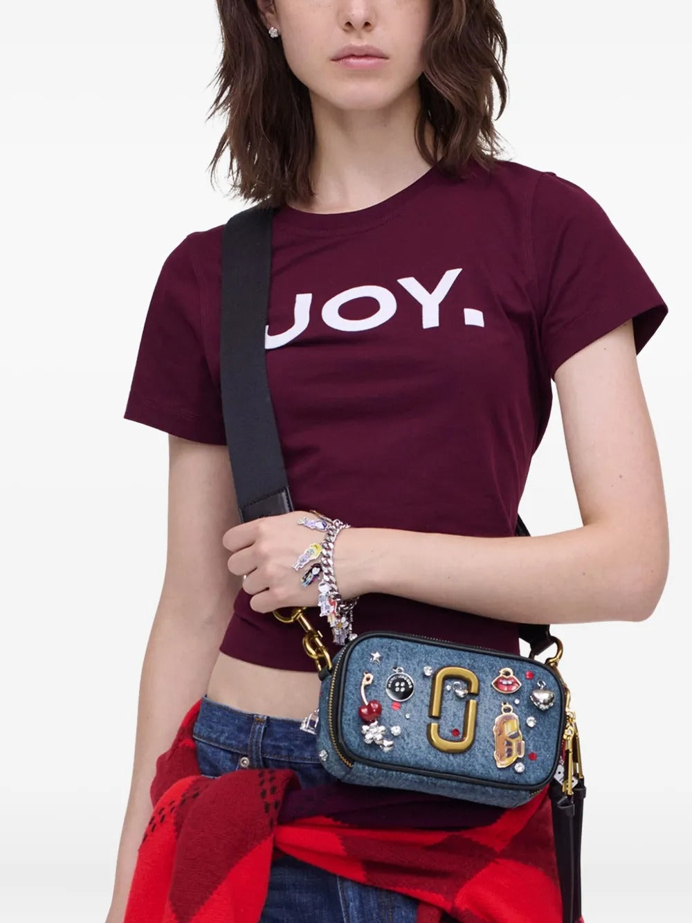 Blue bag worn by a person, showing the bag's fit