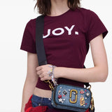 Blue bag worn by a person, showing the bag's fit