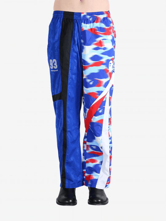 Blue pants worn by a person, showing the pants fit