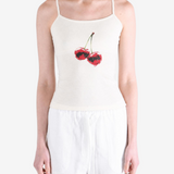 White top worn by a person, showing the top fit