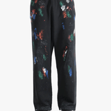 Black pants worn by a person, showing the shirt's fit
