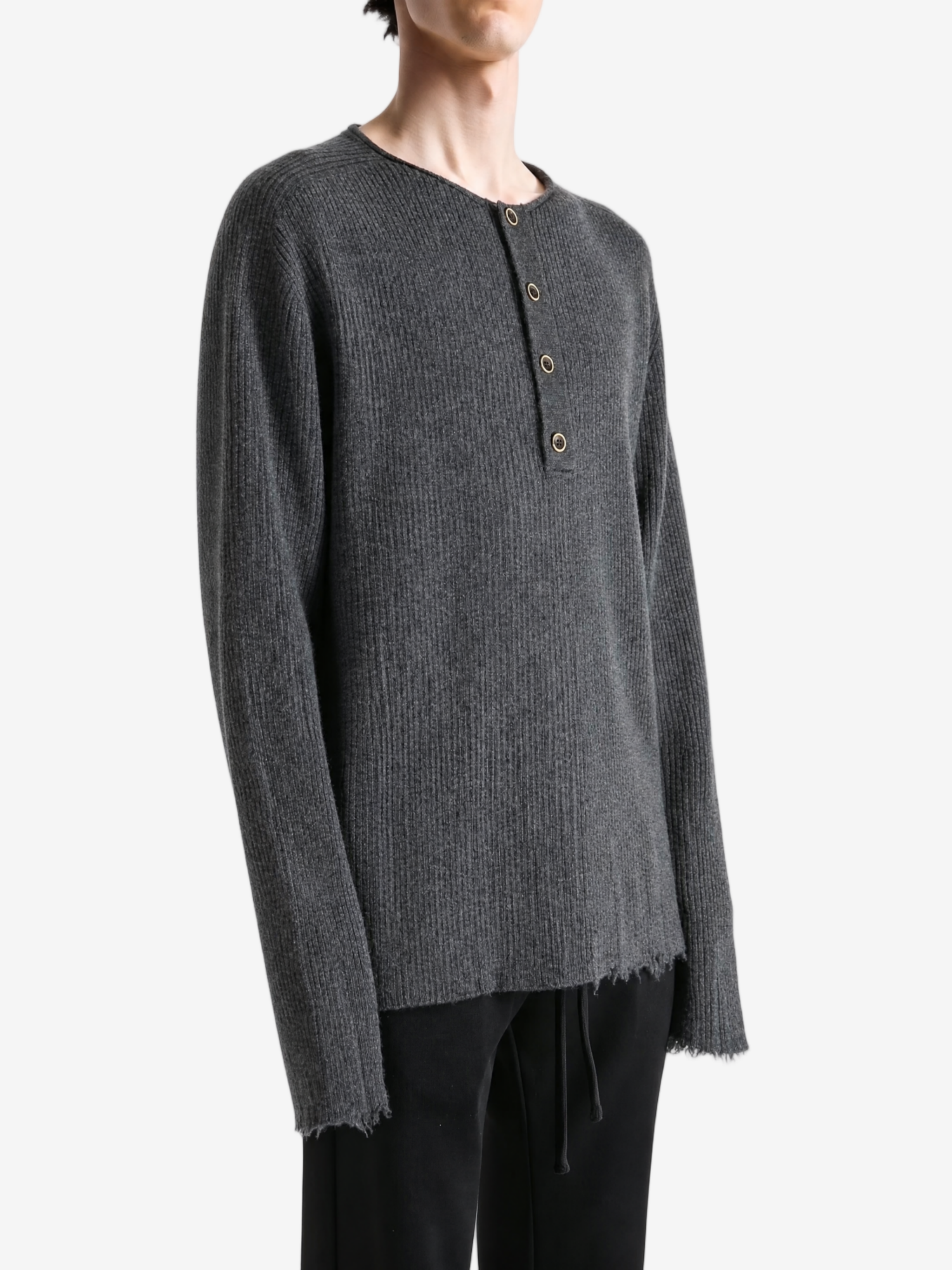 Grey top worn by a person, showing the top fit