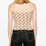 Tan tops worn by a person, showing the tan tops' fit