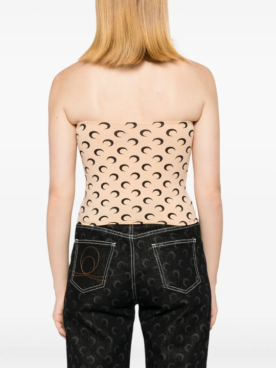 Tan tops worn by a person, showing the tan tops' fit
