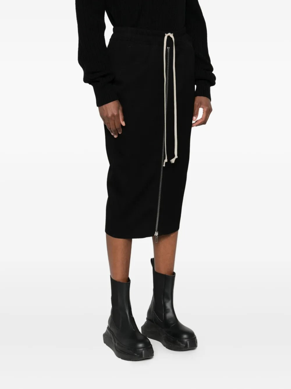 Black skirt worn by a person, showing the skirt's fit