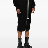 Black skirt worn by a person, showing the skirt's fit