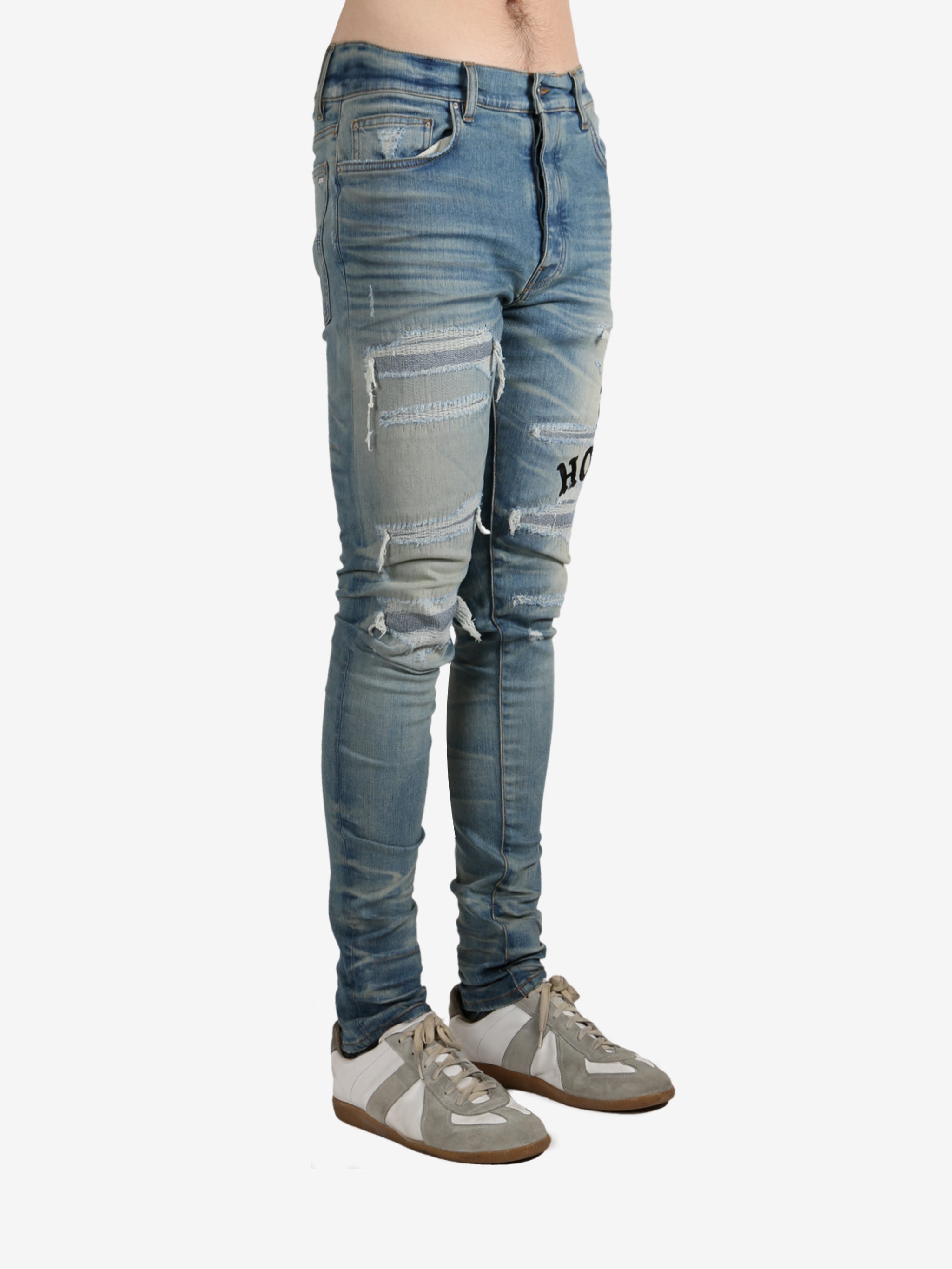 Blue pants worn by a person, showing the pants fit