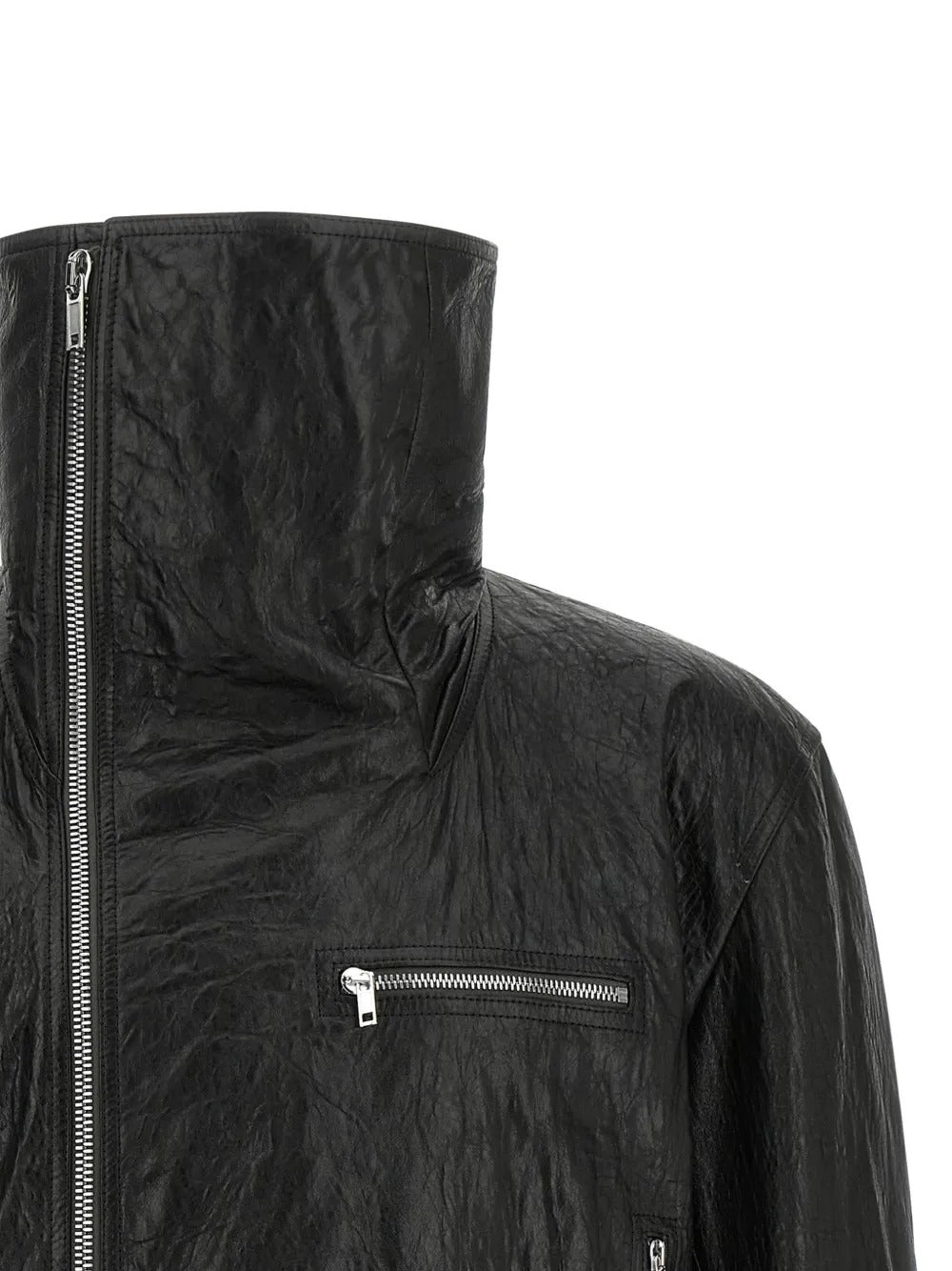 Close up of black jacket, showing texture of the leather fabric