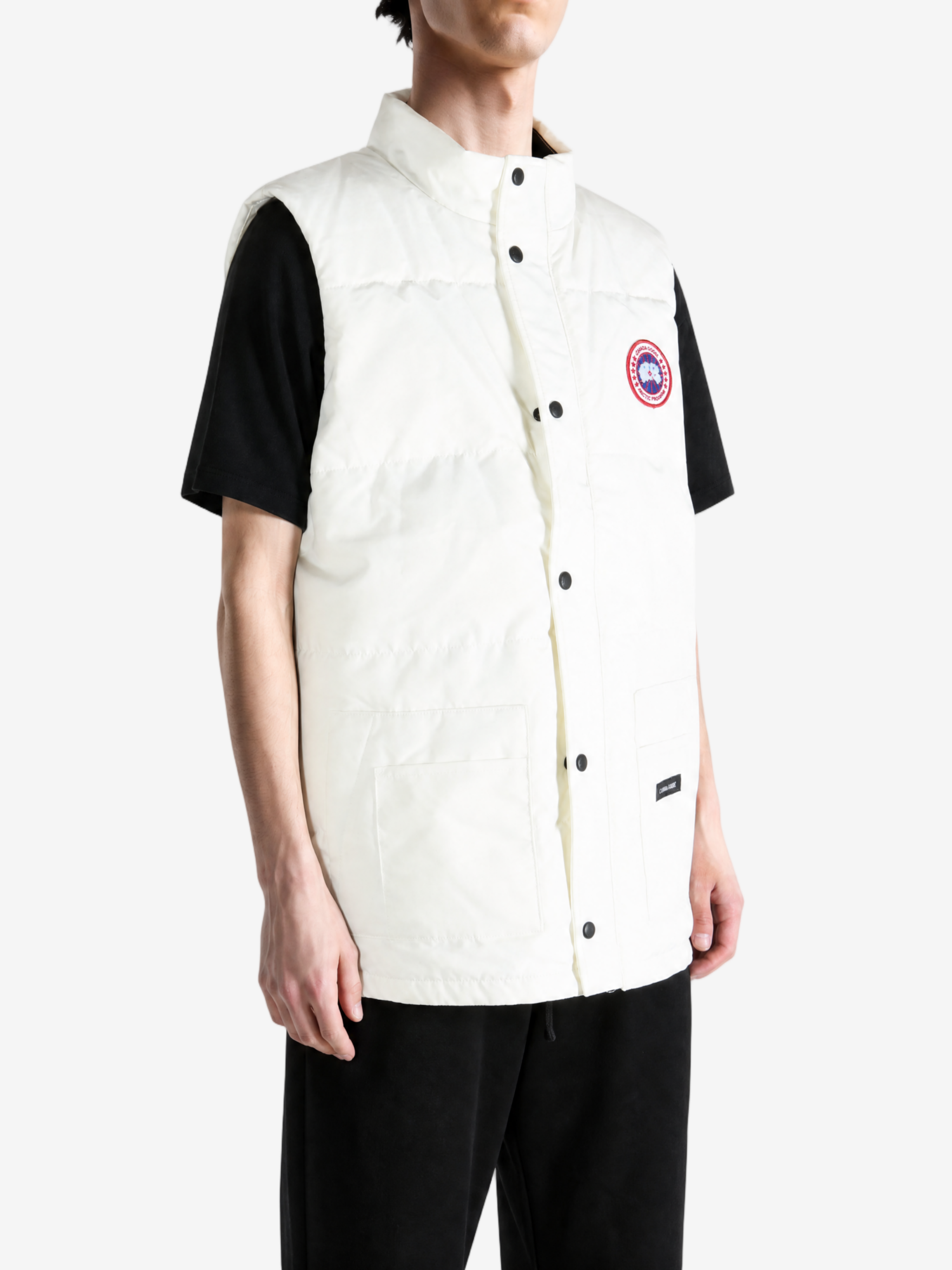 White jacket worn by a person, showing the jacket fit