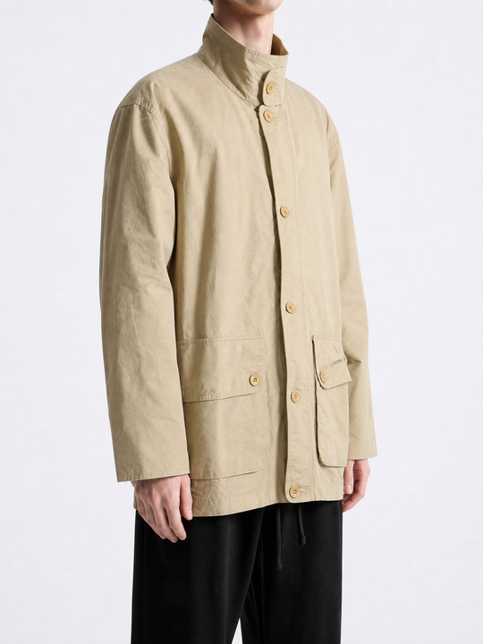 Tan jacket worn by a person, showing the jacket fit
