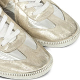 Close up of the grey sneakers, showing texture of the polyester and polyamide fabric