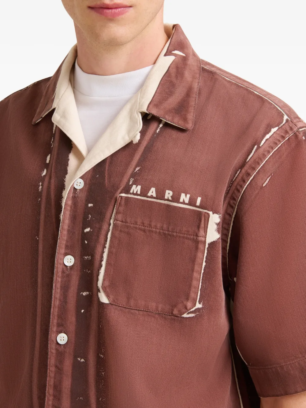 Close up of brown shirt, showing texture of the Cotton fabric