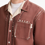 Close up of brown shirt, showing texture of the Cotton fabric