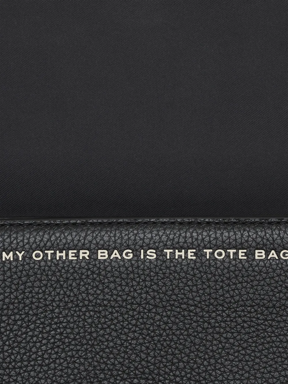 Close up of black bag,showing texture of the leather fabric