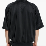 black jackets-coats worn by a person, showing the  jackets-coats fit