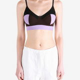 Purple activewear worn by a person, showing the activewear fit