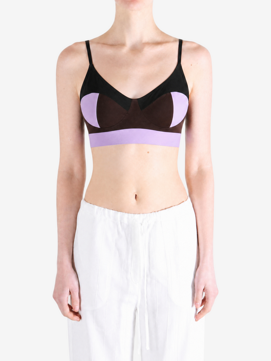 Purple activewear worn by a person, showing the activewear fit