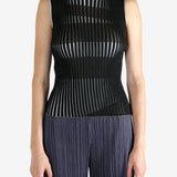 Black shirt worn by a person, showing the shirt's fit