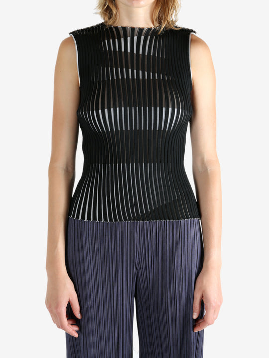 Black shirt worn by a person, showing the shirt's fit