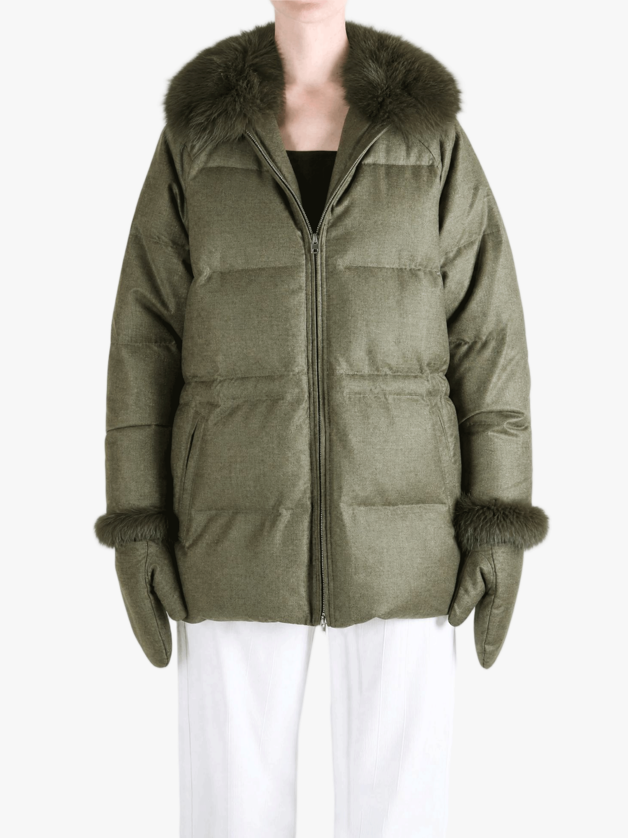 Green jacket worn by a person, showing the jacket fit