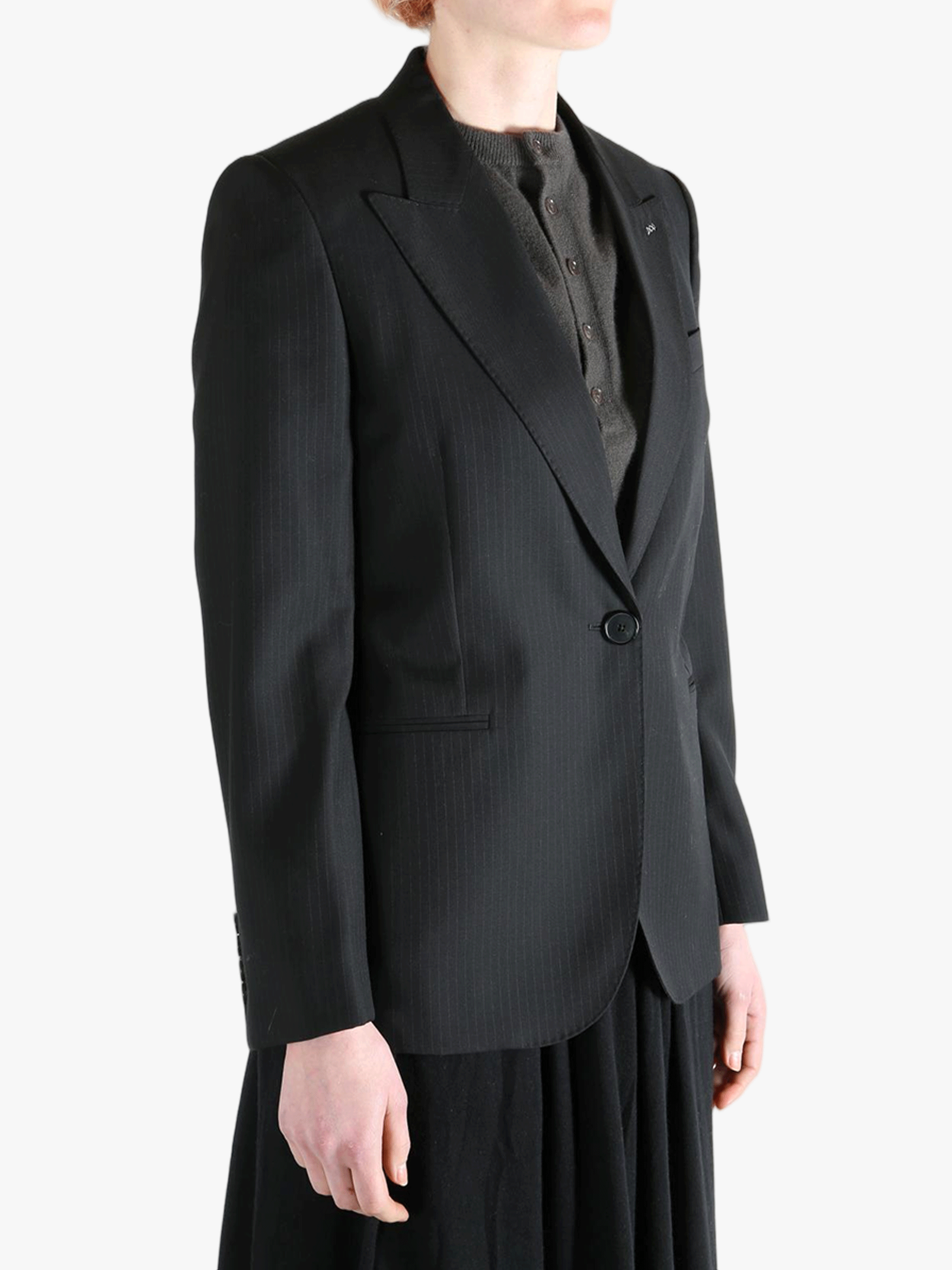 Black jacket worn by a person, showing the jacket's fit