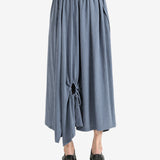 Grey skirt worn by a person, showing the skirt fit