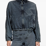 Black jacket worn by a person, showing the jacket's fit