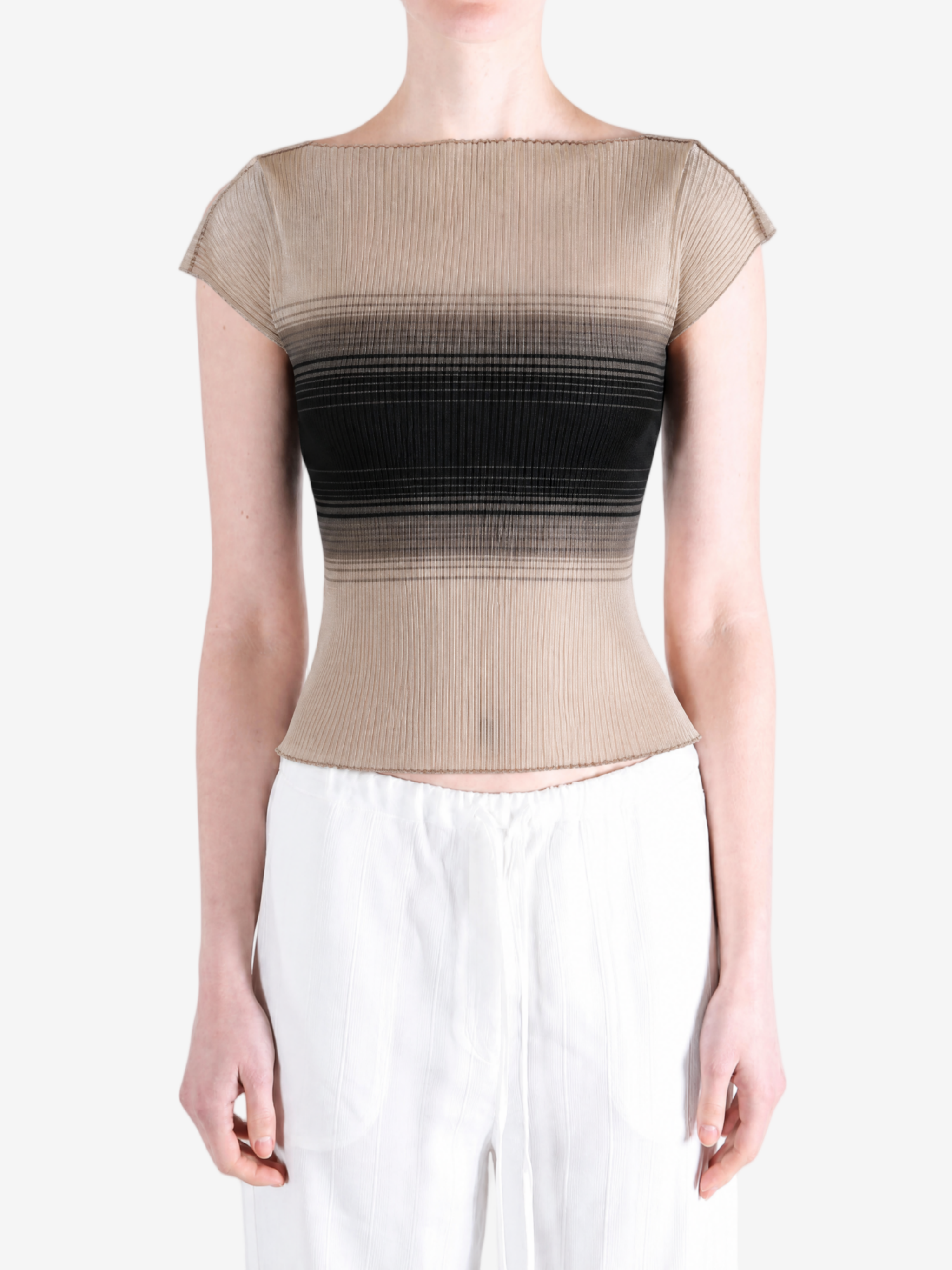 Tan top worn by a person, showing the top fit