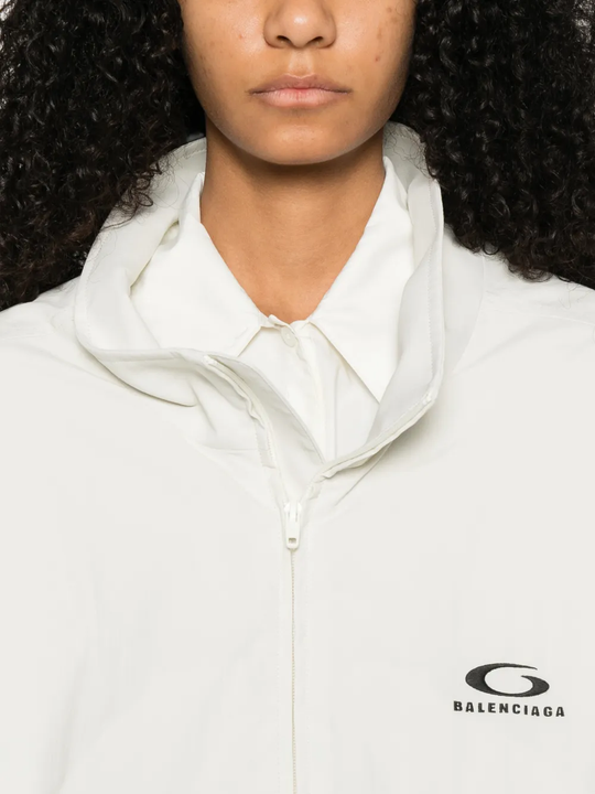 Close up of white jacket , showing texture of the Polyamide fabric