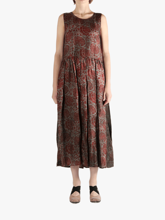 Red dress worn by a person, showing the loose fit.